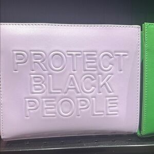 Purple Embossed Statement Clutch